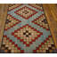 Tapis crocheté antique à motif d'art populaire