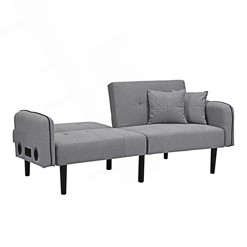 Canapé-lit confortable avec repose-pieds et chaîne stéréo