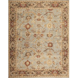 International Hand Knotted Wool Area Rug in Blue/Walnut
