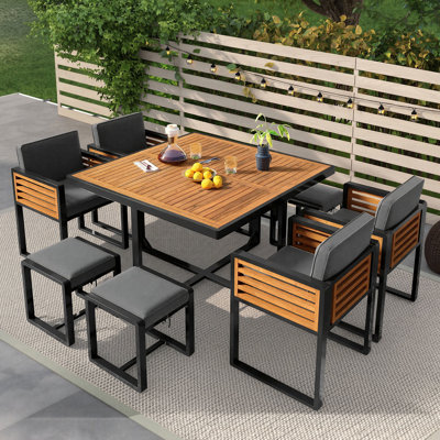 Ensemble de salle à manger 9 pièces en bois d'acacia de qualité supérieure avec coussins, 4 chaises rembourrées, 4 repose-pieds et 1 table carrée