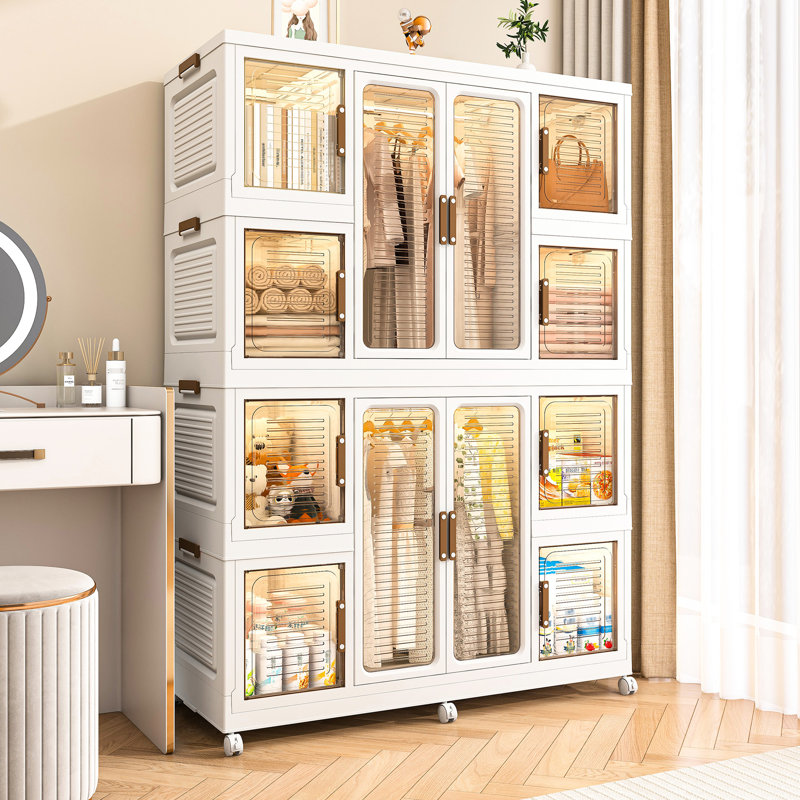 Grand garde-robe de rangement portatif avec 12 et 2 tringles de suspension pour organiser vos articles. , Tiges, portes magnétiques. Range les vêtements et les articles. Pp & Abs. Assemblage rapide. Blanc