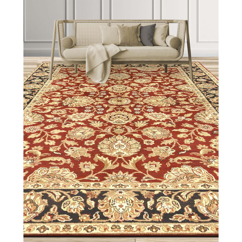 High-quality hand-knotted red and black area rug