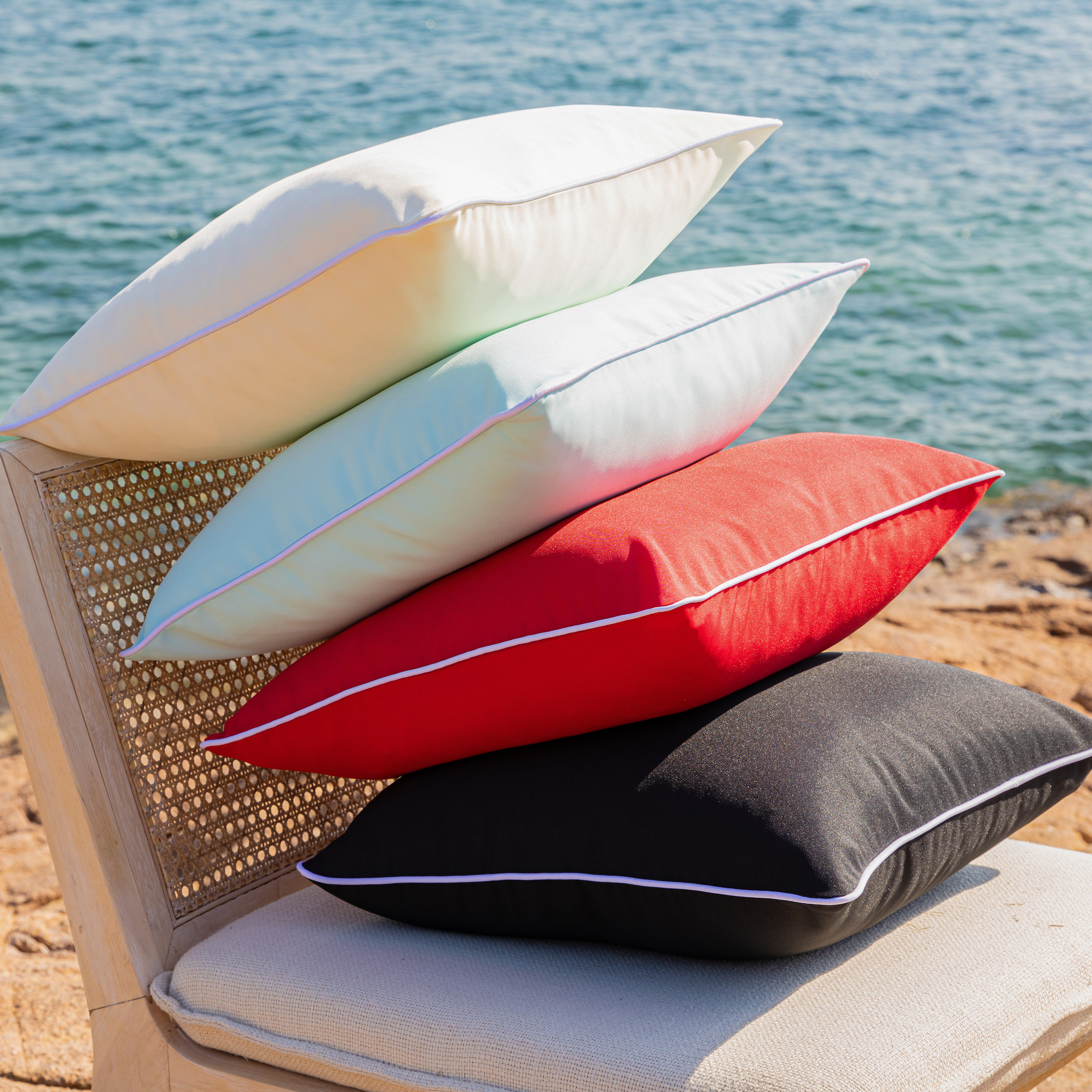 Green and white striped outdoor outlet pillows