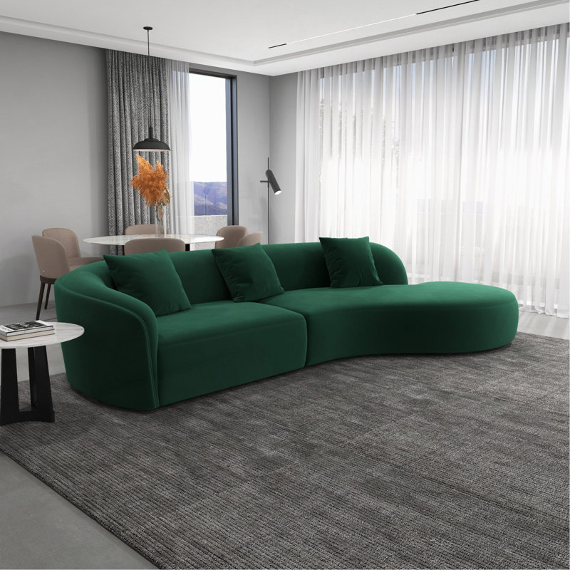 Canapé modulaire Graceful Curvy pour des décors polyvalents qui rehaussent le confort et le style., Velours vert