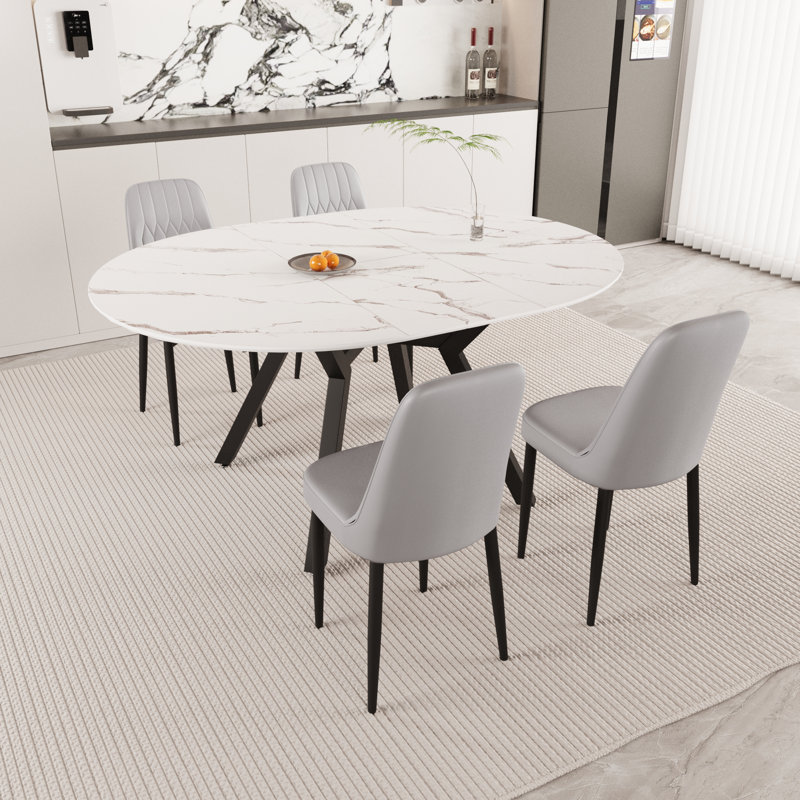 Tables de salle à manger extensibles de 47 à 63 po, équipées de 4 chaises de salle à manger rembourrées en tissu polyuréthane épais, d'une table de salle à manger, d'une table et d'une chaise élégantes et spacieuses, avec des pieds en métal noir