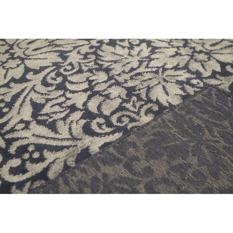 Tapis bleu de haute qualité noué à la main
