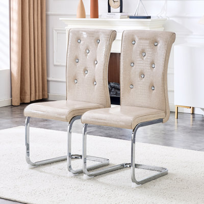 Ensemble de 2 chaises de salle à manger en peau d'alligator rétro avec boucles en cristal et pieds en métal galvanisé pour une assise élégante.