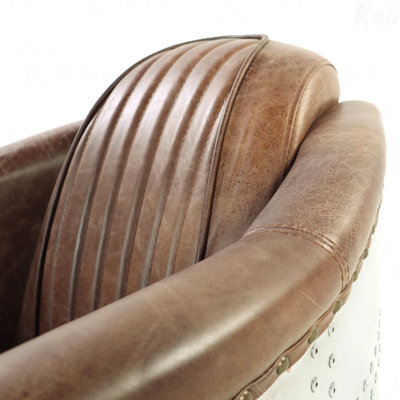 Fauteuil en cuir fleur et aluminium parfait pour les salons modernes