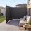 Auvent latéral rétractable, écran latéral de patio rétractable 71 po x 236 po avec tissu en polyester de 180 g / m², écran pare-soleil d'intimité imperméable pour jardin, balcon, piscine, terrasse, gris