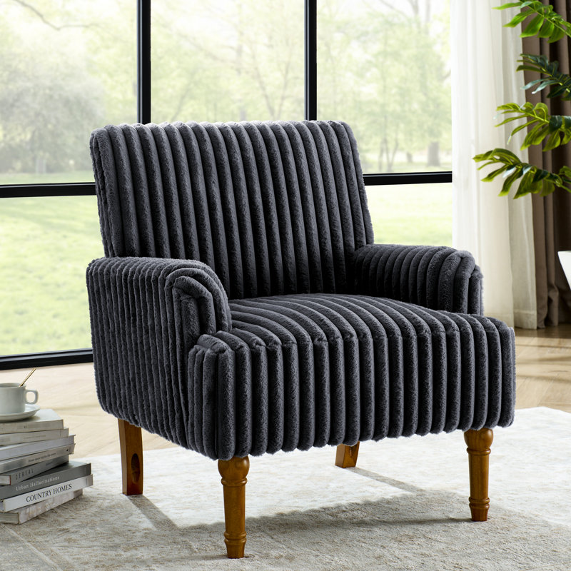 Fauteuil gris foncé de style moderne du milieu du siècle, recouvert de velours côtelé de 5 cm de large et doté de 9 pieds en bois massif, idéal pour un salon confortable et relaxant.