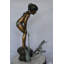 Copper and Metal Girl Looking at Frog Jumping Fountain