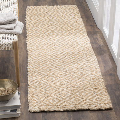 Tapis en fibres naturelles de jute tissé à la main à motif géométrique Aerionna