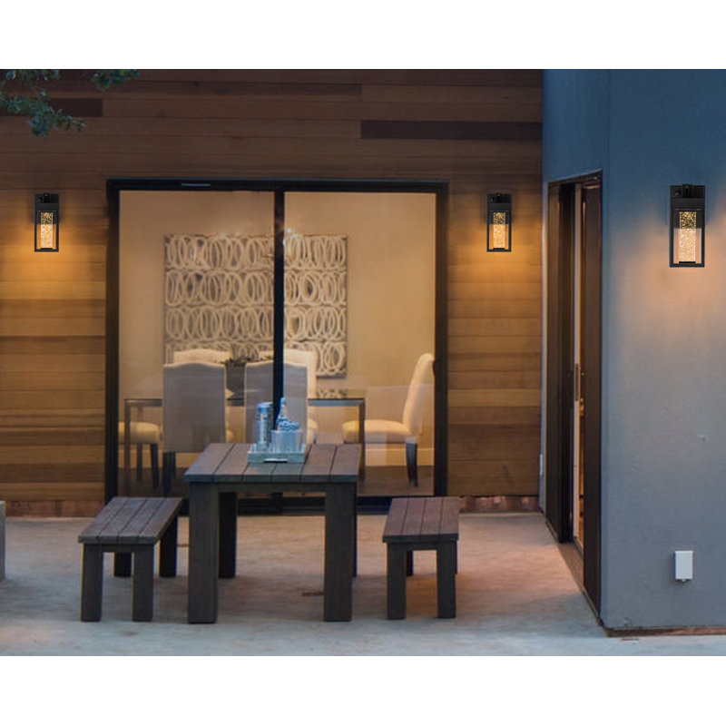 Farhib Modern LED 3000K Dusk to Dawn and GFCI Outlets Sensor Outdoor Black Wall Lantern Sconce with Seeded Glass