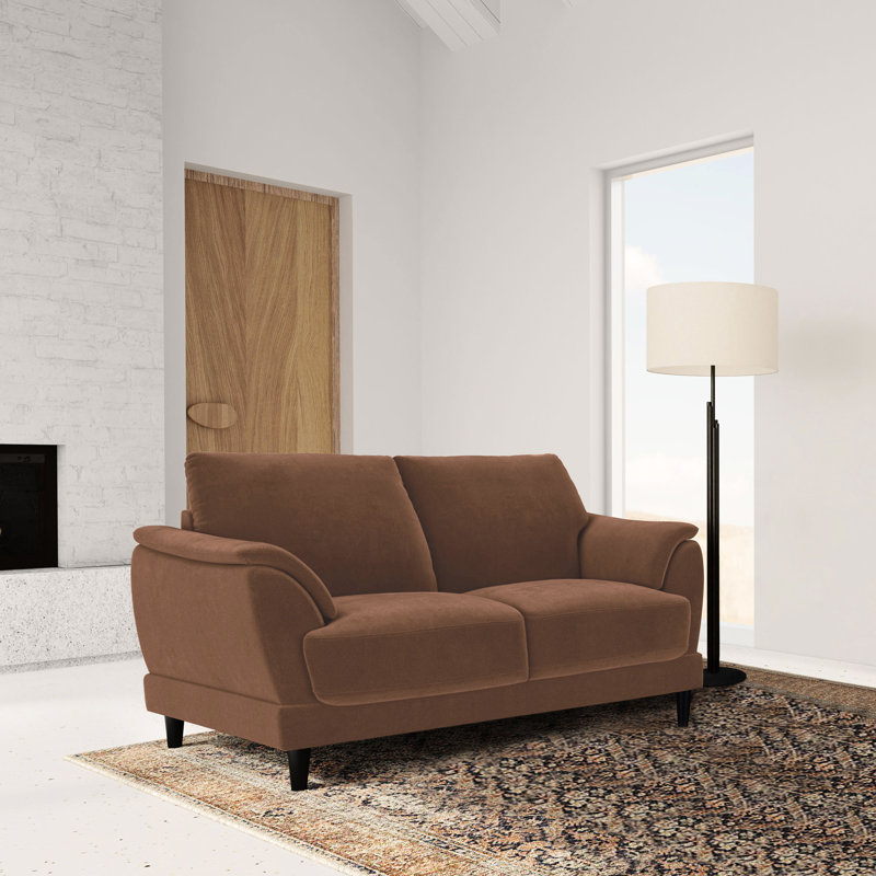 Rust Upholstered Featuring Curved Arms And Attached Seat For A Sophisticated Look Retro - Style With Upholstery, Graceful Arms, Pillow Back Relaxing Seating Atmosphere