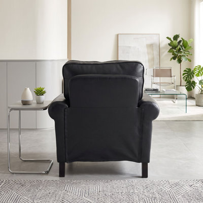 Fauteuil club en similicuir avec accoudoirs roulés et garniture cloutée pour les salons et les salons