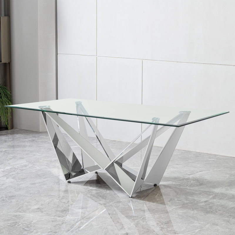Table en verre transparent avec base en acier inoxydable poli