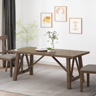 Élégante table de salle à manger en bois massif au design extensible, parfaite pour les réunions de famille et les invités.