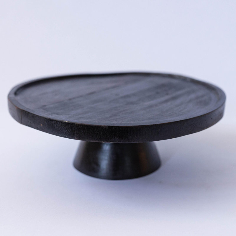 Plateau rond noir sur socle