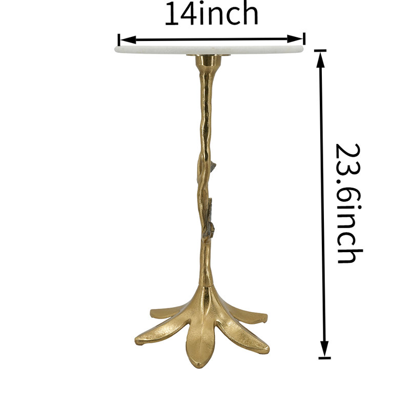 Table d'appoint décorative à motif de branches feuillues, piètement en aluminium doré et plateau rond en marbre blanc, de style organique, idéale pour la décoration du salon.