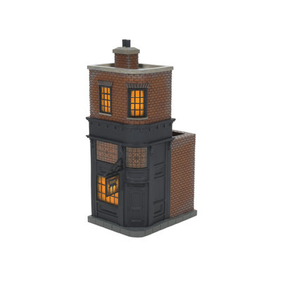 Village building illuminated by the cauldron department of Leaky Cauldron