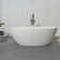 66.93" L X 30.7" W X 22.05" H Matte White Freestanding Solid Surface  Bathtub SWBT01-6731