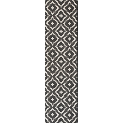 Tapis géométrique noir / blanc Boucher