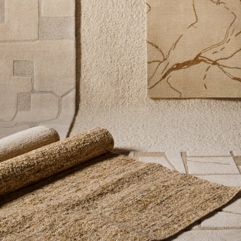 A selection of neutral-toned rugs.