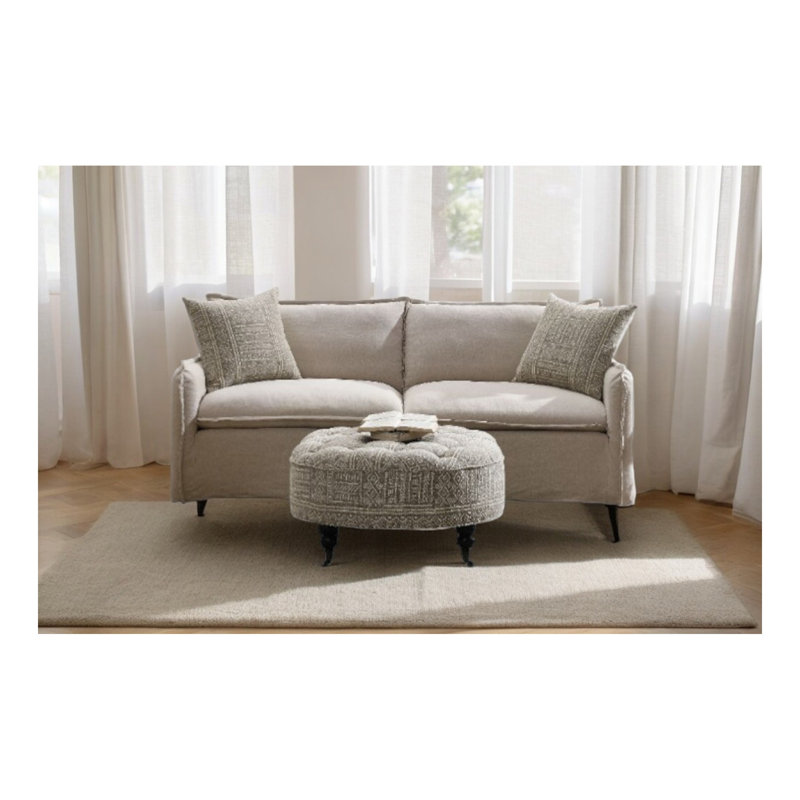Canapé en tissu beige avec 2 coussins décoratifs Upend