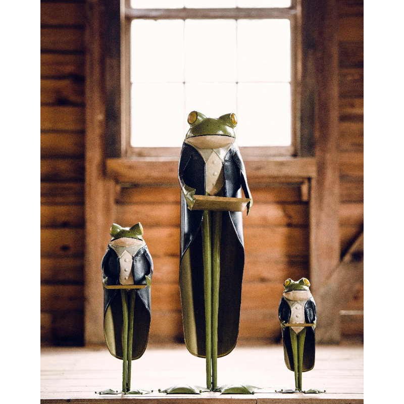 Statue de grenouille et serveur Dumb