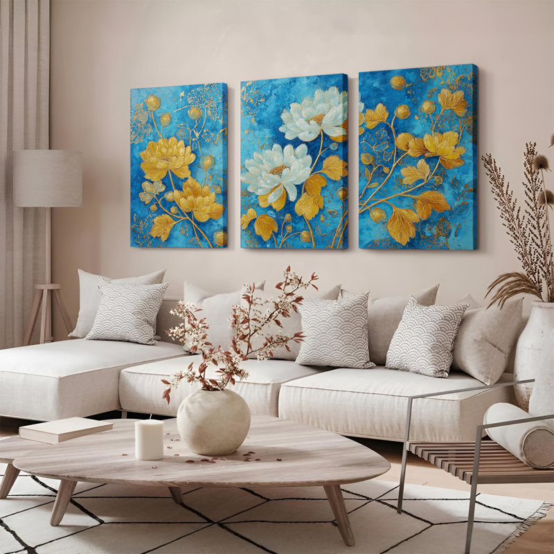 Ensemble de 3 tableaux sur toile à motif floral bleu et or, H 18 po x l 36 po