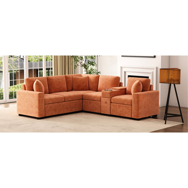 Canapé-lit d'angle modulaire orange de 306 cm (120,5 po) avec lit gigogne, espace de rangement, porte-gobelets et coussins amovibles pour un confort optimal au salon. Solution intelligente et confortable en forme de L.