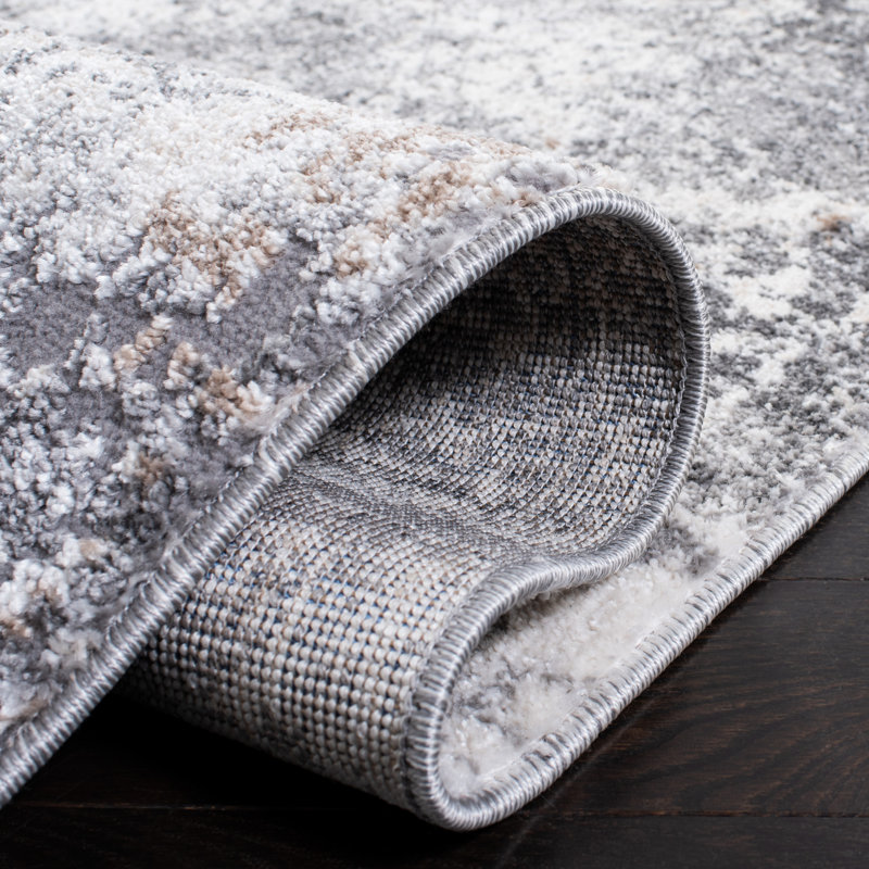 Ivory and Grey Abstract 10' x 14' Stain-Resistant Synthetic Area Rug