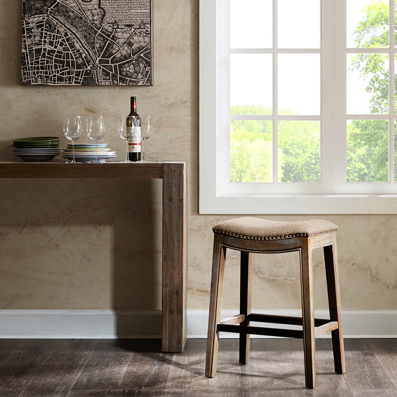 Tabouret de comptoir polyvalent avec pieds en bouleau et fonction ornement en cuivre