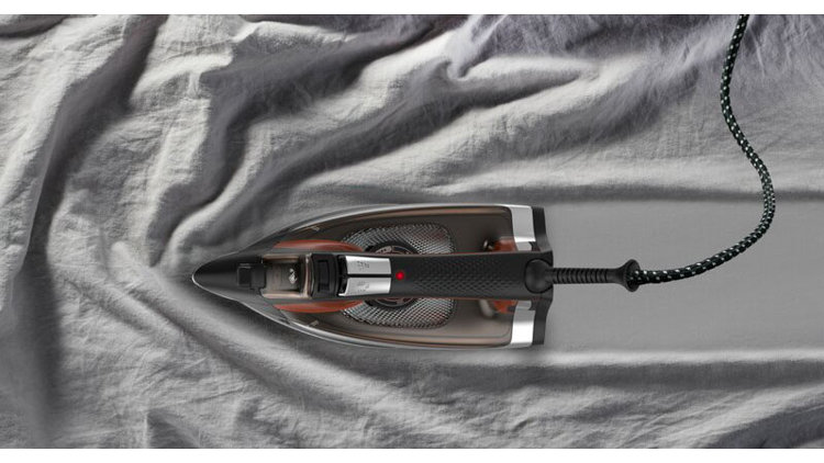 black iron ironing gray cloth