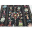 Rug & Kilim’S Suzani-Inspired Kilim, Vibrant Floral Medallions Over Black