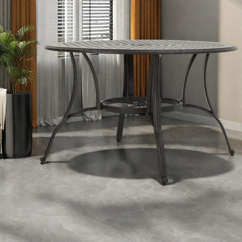 Tables de salle à manger élégantes en fonte d'aluminium, finition bronze, style traditionnel pour les espaces extérieurs