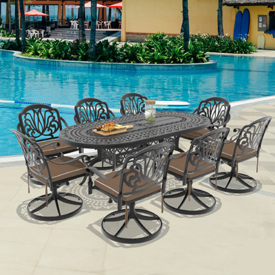 9-Piece Oval Cast Aluminum Outdoor Patio Dining Set with Swivel Chairs & Brown Cushions & Umbrella Hole