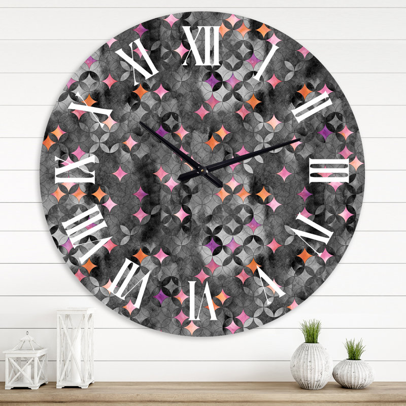 Horloge murale moderne à cercles géométriques entrecroisés avec des étoiles roses, Surdimensionné