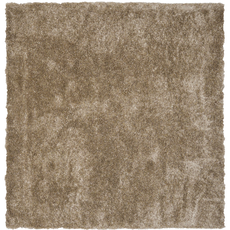 Delane Handmade Tufted Brown Area Rug
