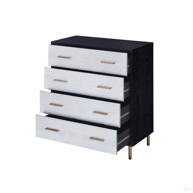 Commode noire, argentée et dorée
