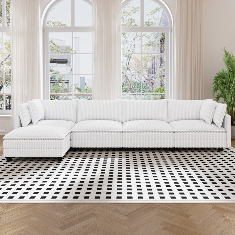 Canapé modulaire en L 143 po avec 1 repose-pieds Cloud, Velours côtelé blanc