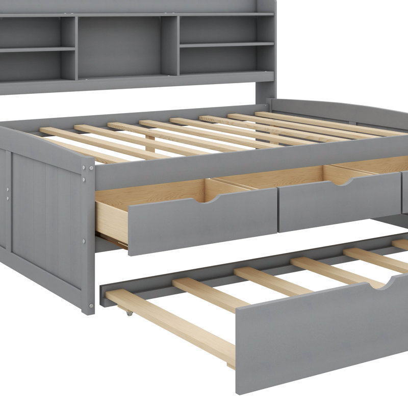Lit double spacieux en bois avec tablettes et trois tiroirs de rangement