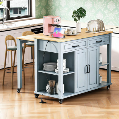 47 Inch Kitchen Island with Extendable Dining Table, Storage, Power Outlet, and Adjustable Shelves for Modern Kitchens.