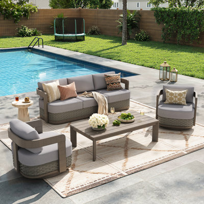 Ensemble de conversation pivotant Manarola Patio en aluminium et résine tressée PE avec coussins Sunbrella® pour 5 personnes
