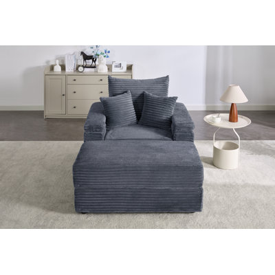 Canapé simple avec porte-gobelet et repose-pieds