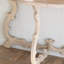 Console semi-circulaire sculptée de style français