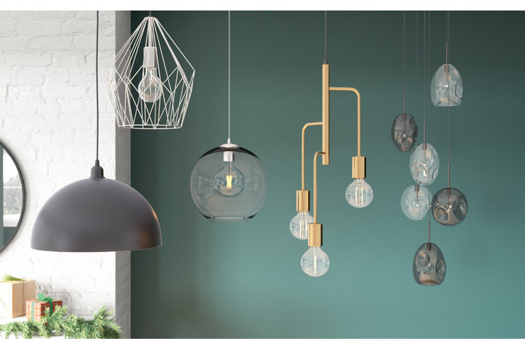 image of four different hanging pendant lights against a green background
