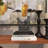 Polystone Weathered Patina Linked Hands Decorative Sculpture with Block Base and Gold Accents