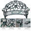 Banc d'extérieur en fonte durable avec accents floraux roses et finition antique pour un élégant siège de jardin