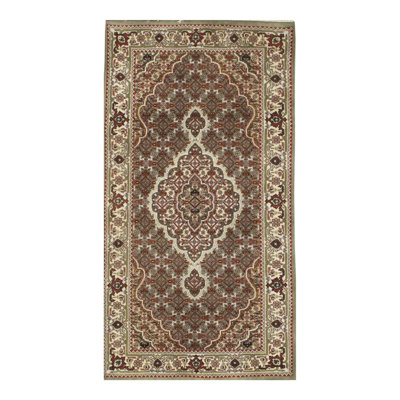 Lowney Cotton Oriental Area Rug in Brown